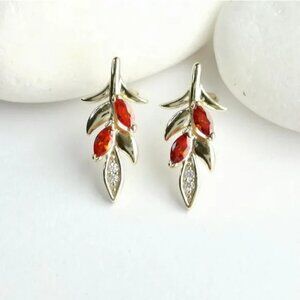 Garnet and White Topaz stud earrings 14k gold leaf design